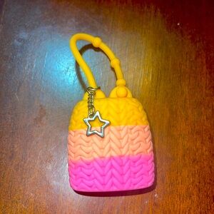 Bath and body Works hand sanitizer holder, pink and orange